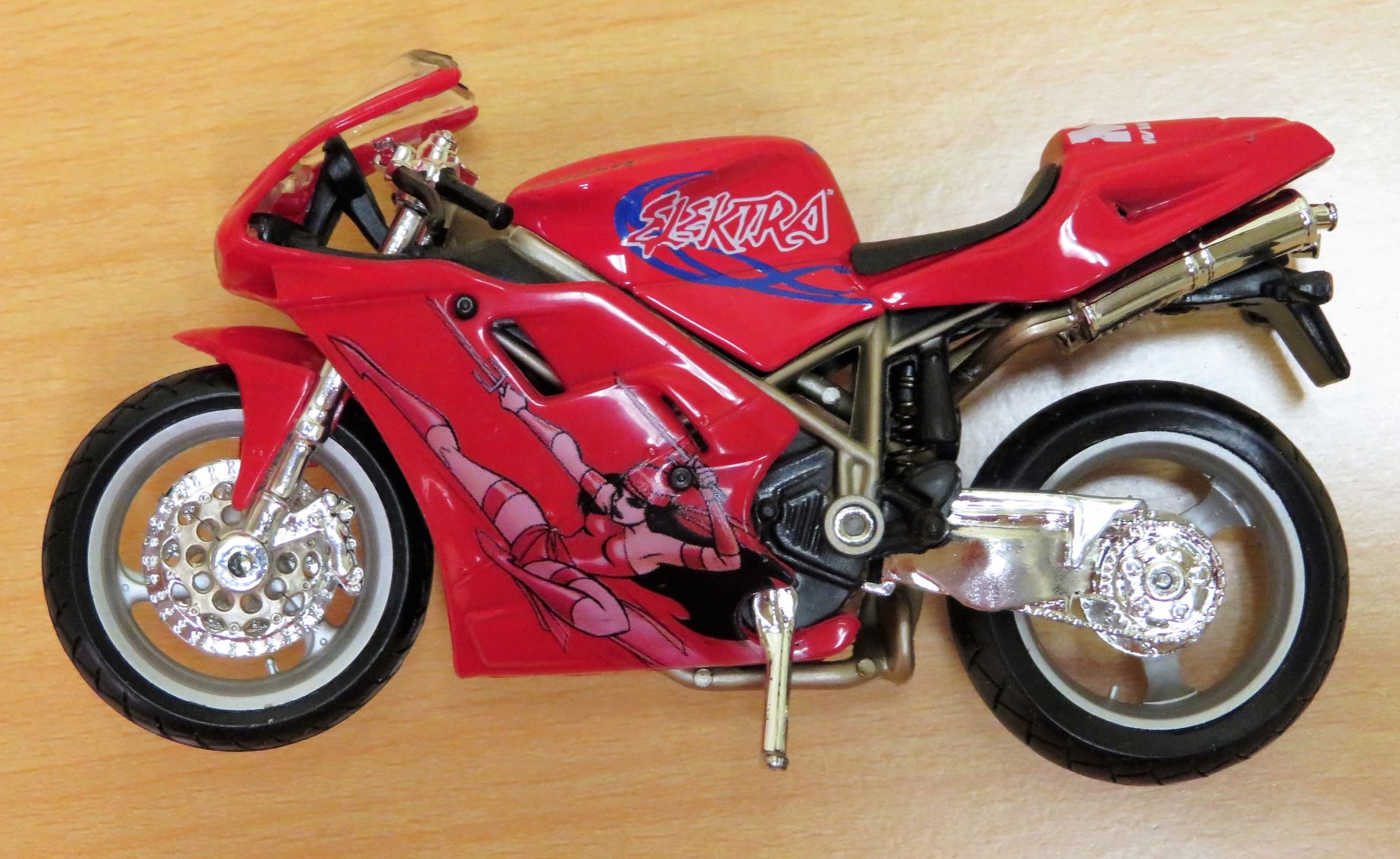 Maisto - Ultimate Marvel Motorcycle Collection - Elektra Ducati 748 [Brian  Carnell's Wiki]