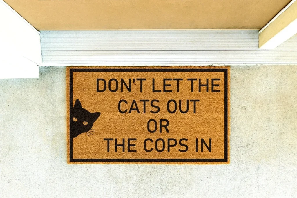 Doormat: Don't Let The Cats Out or The Cops In